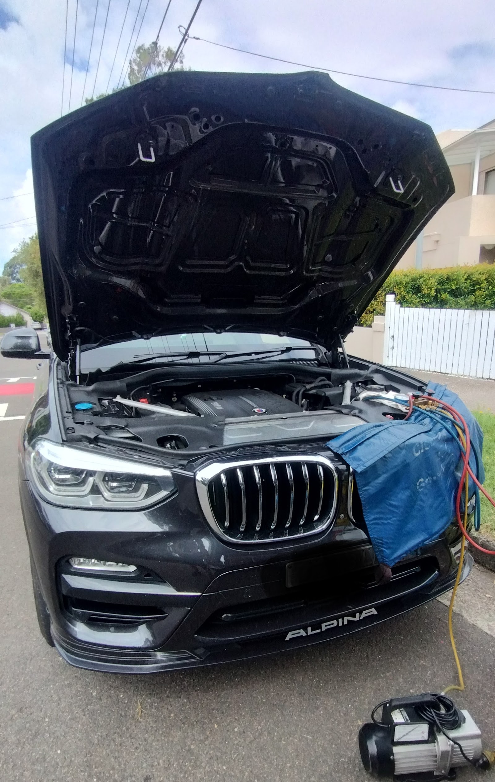 Mobile A/C service on a BMW X3 Alpina